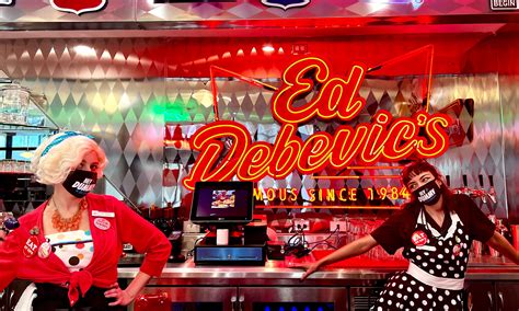 Ed debevic's chicago - The notorious Ed Debevic’s was opened in 1984, and has been renowned as Chicago’s most famous retro themed diner ever since. Famously known for its snarky service & 1950s throwback decor, Ed’s quickly became a fun & unique staple in the culinary world. 